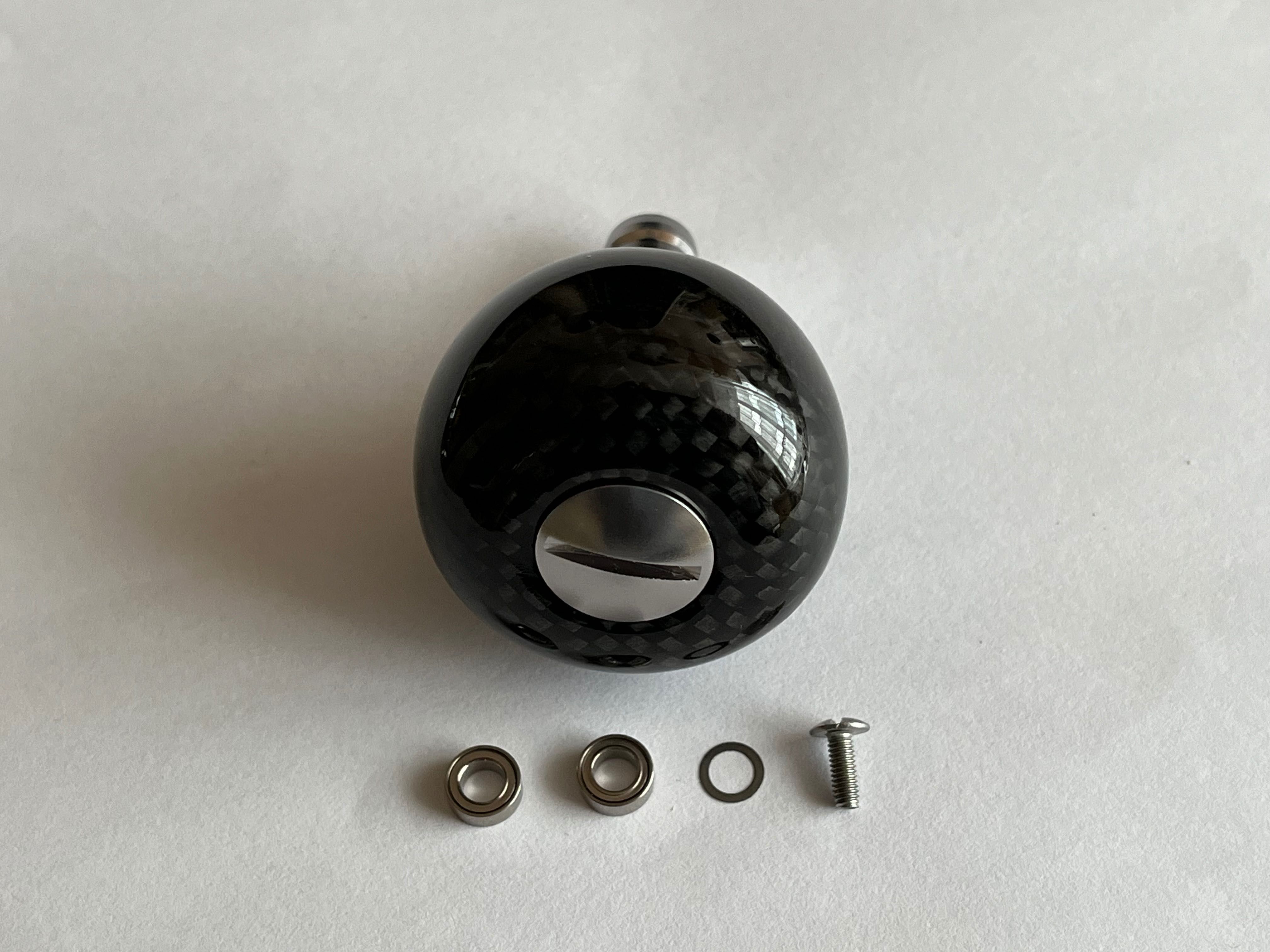 Knob tuningowy z włókna węglowego do kołowrotków Shimano, Daiwa