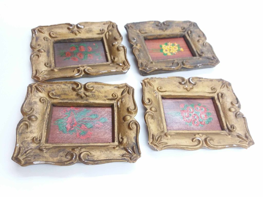 Cztery malowane miniaturki obrazki z motywem kwiatowym