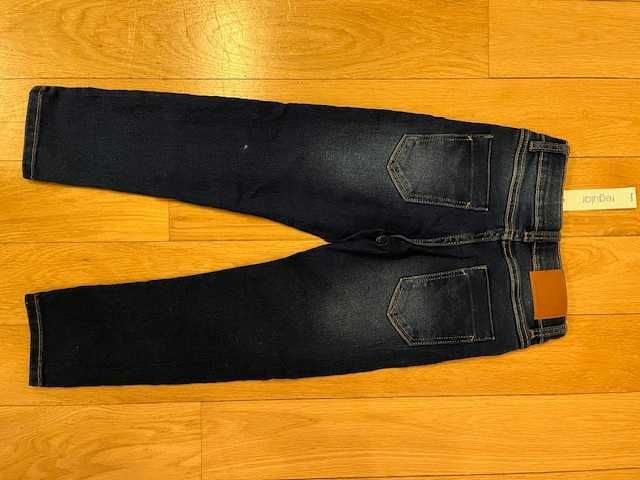 Spodnie dla chłopca w kolorze niebieski w rozmiarze 116 cm