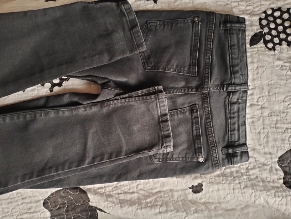 Reserved, czarne spodnie dziewczęce, nowe, rozcięcie,r. 146