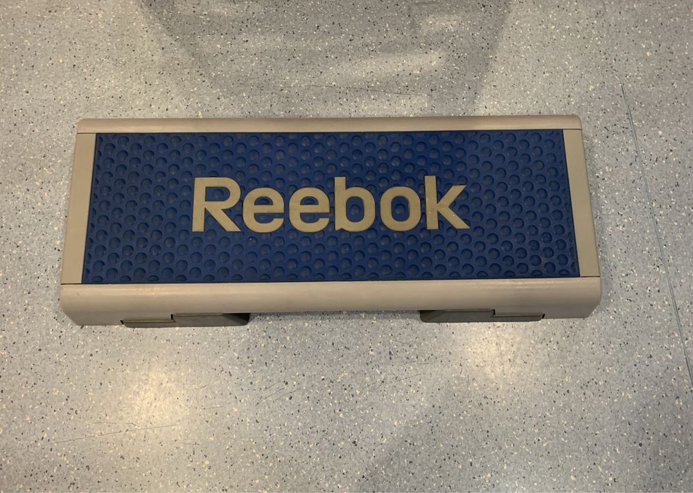 STEP Reebok.