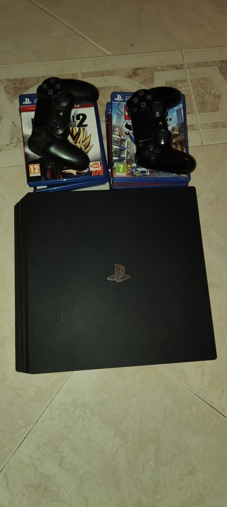 Ps4 com jogos e na caixa