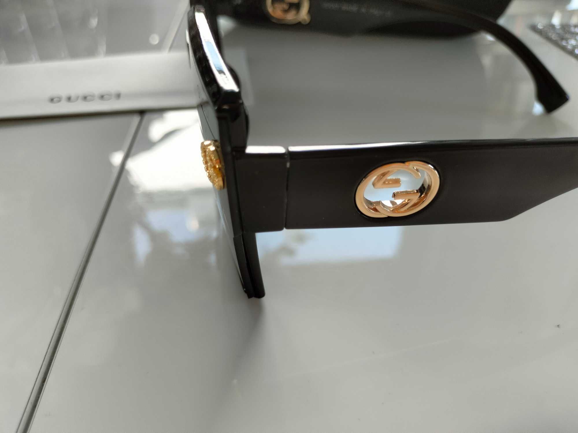 Okulary logowane z zamszowym etui nowe