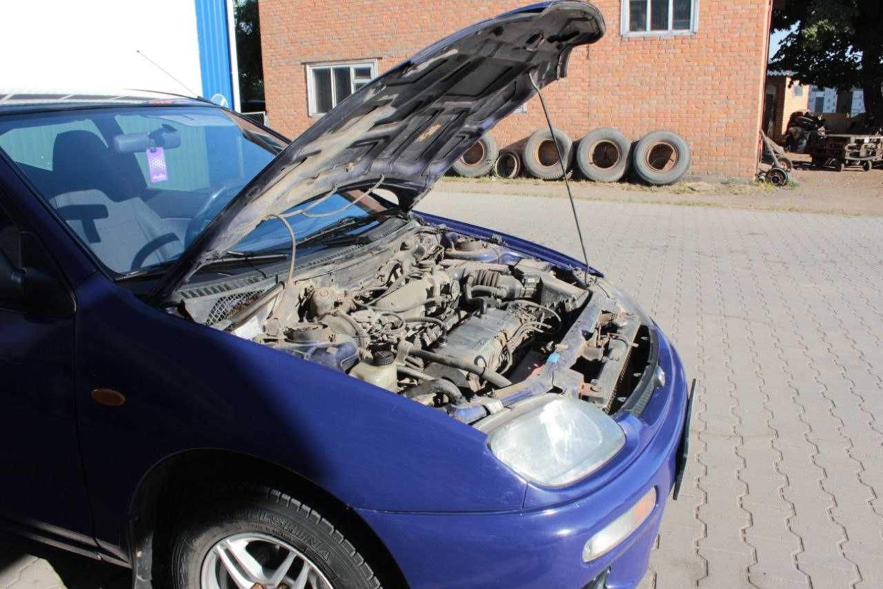 Мазда 323 f Mazda 323 BA f 1/3 газ бензин