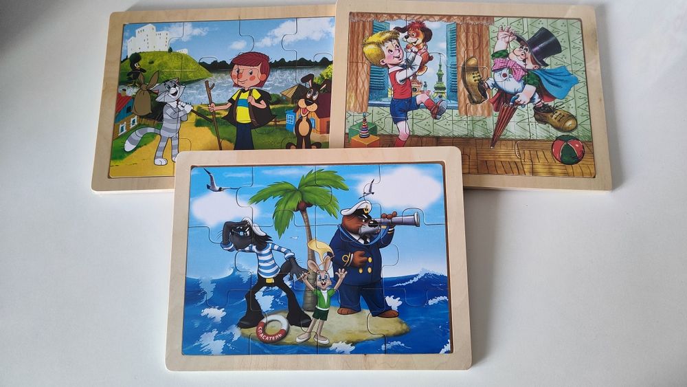 Дерев'яні іграшки пазли і вкладиші, вставки.