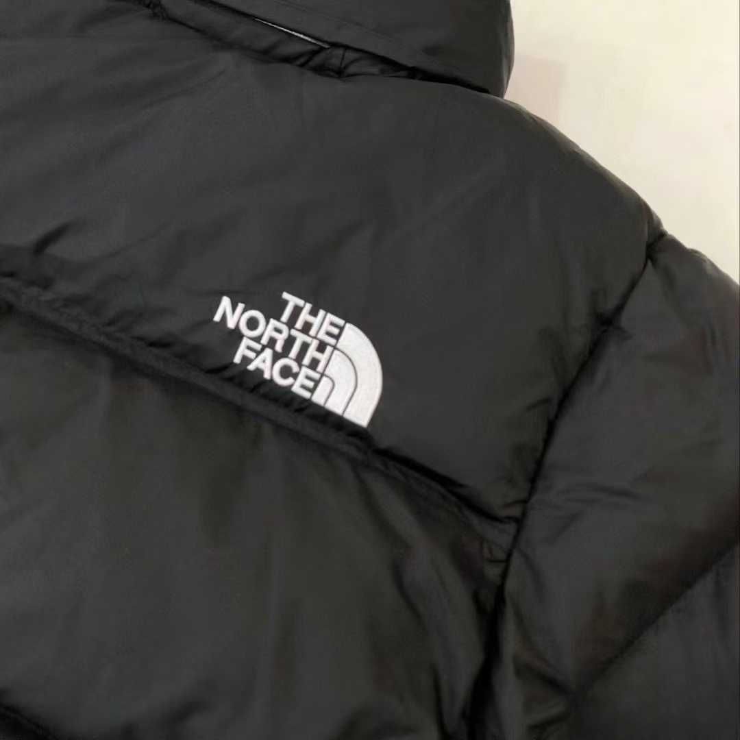 Stylowe puchowe kurtki The North Face dla par. rozmiar: L