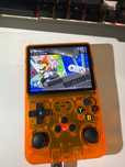 Konsola r36s pomarańczowa emulator