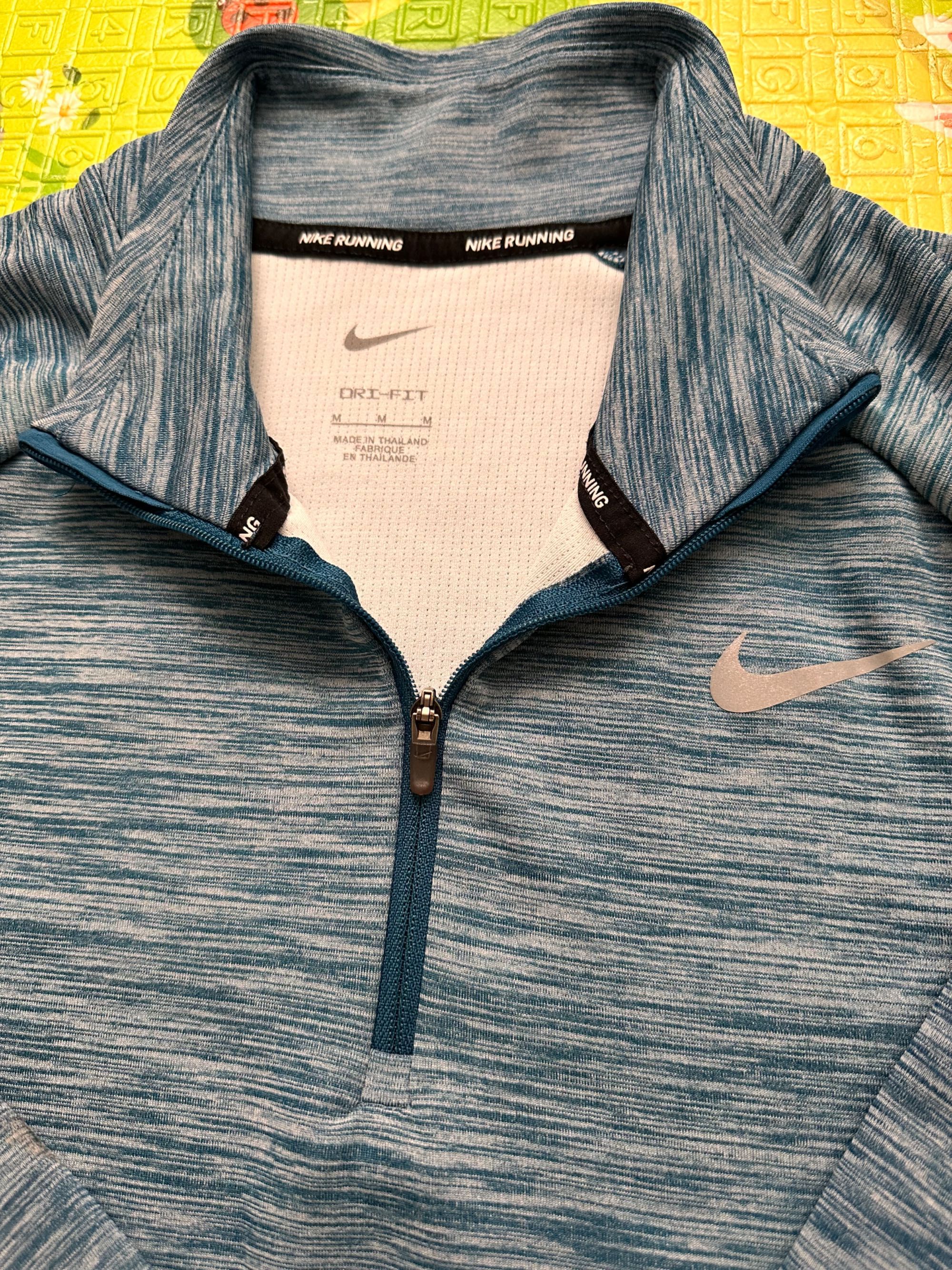 Жіноча бігова кофта Nike PACER, блакитна розмір M