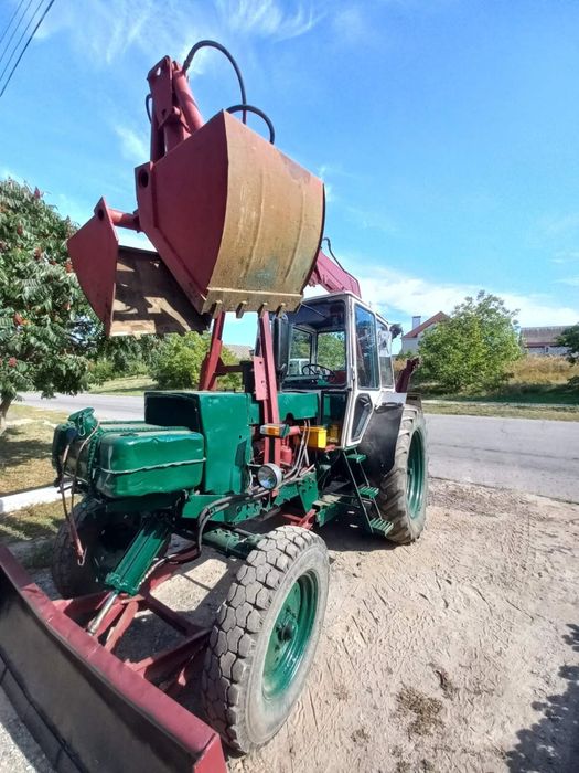 Грейферний погрузчик юмз