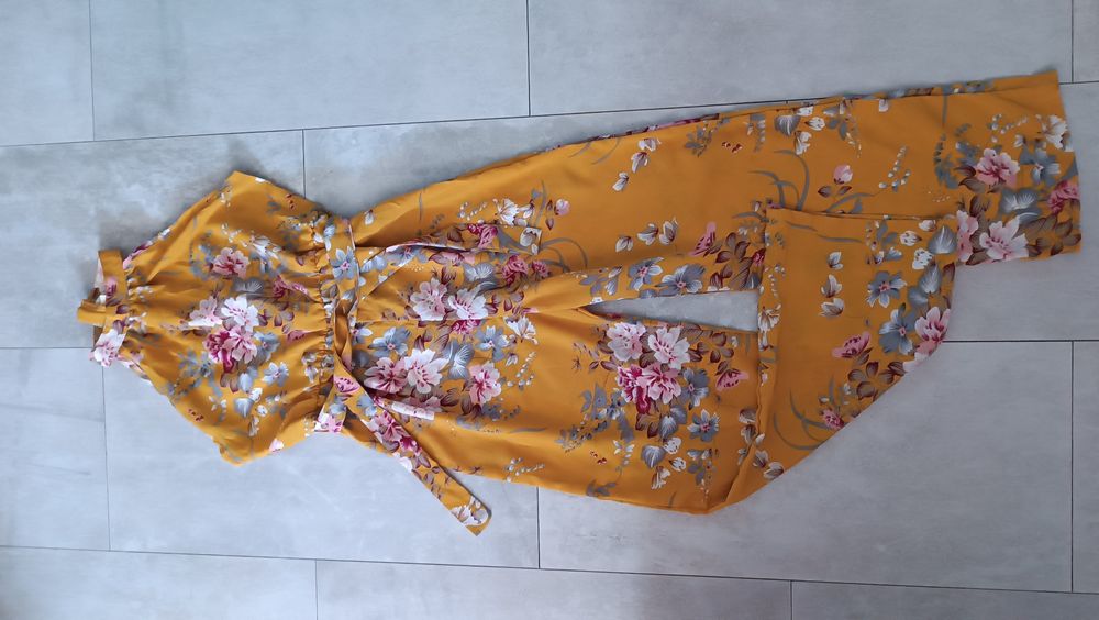 Piękny kombinezon w kwiaty 146