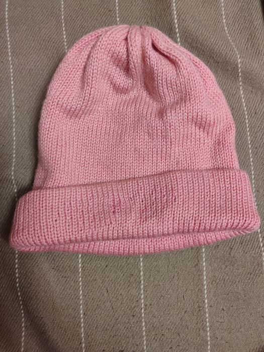 Жіноча шапка рожевого кольору