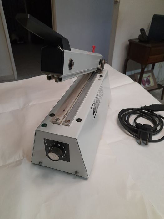 Máquina  de fechar sacos  23 5 cm