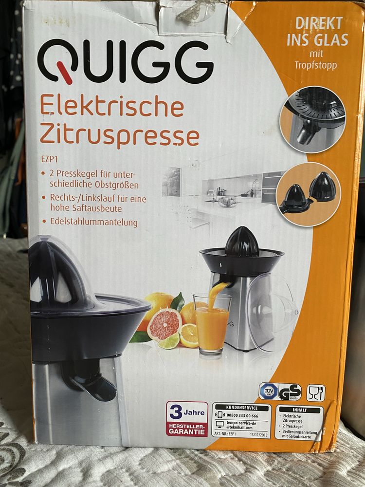 Elektryczna wyciskarka do cytrusow  Quigg