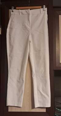 Białe spodnie Orsay 34