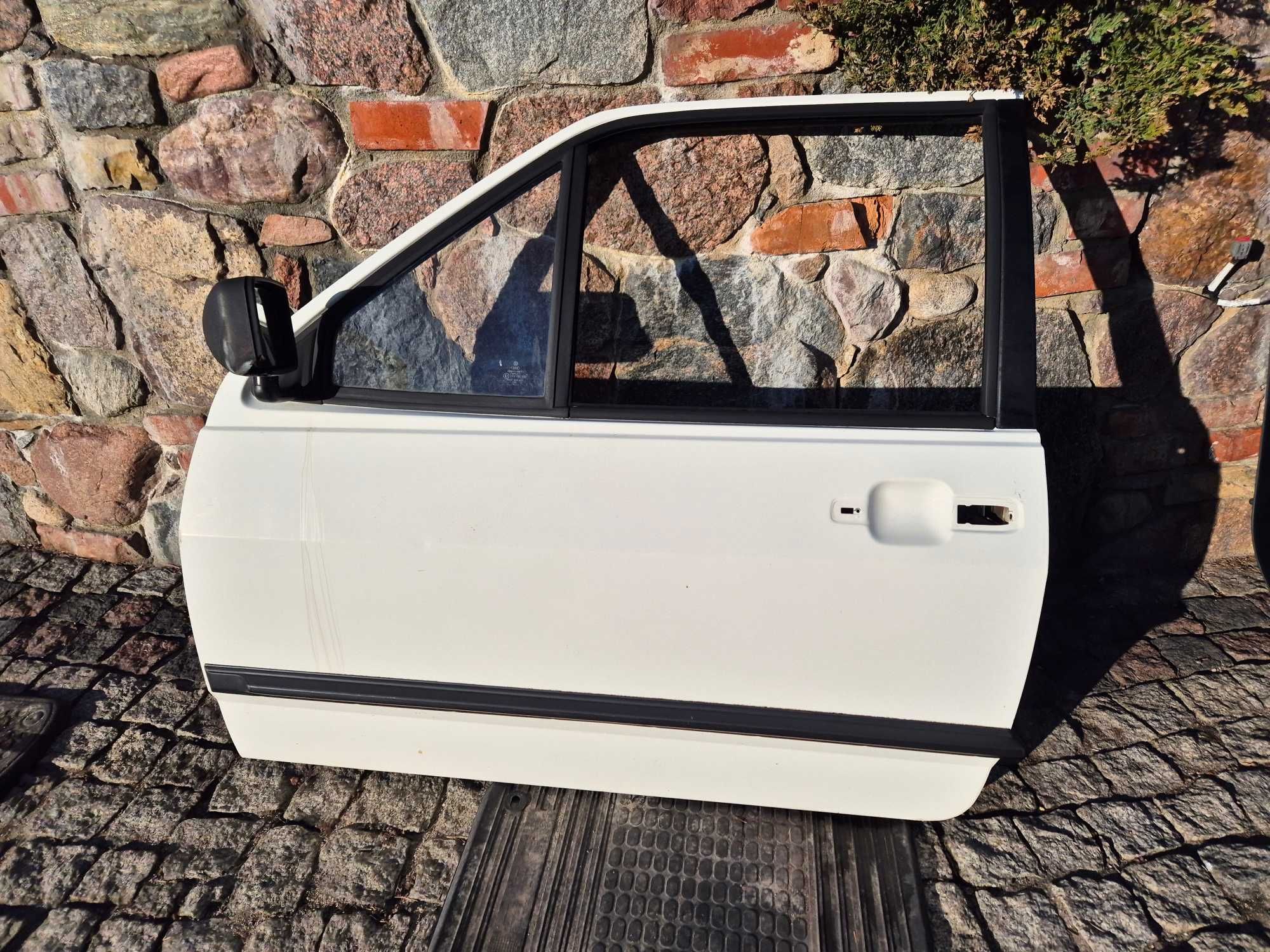 drzwi przednie lewe lewy przód vw polo II coupe 3 drzwi oryginał igła