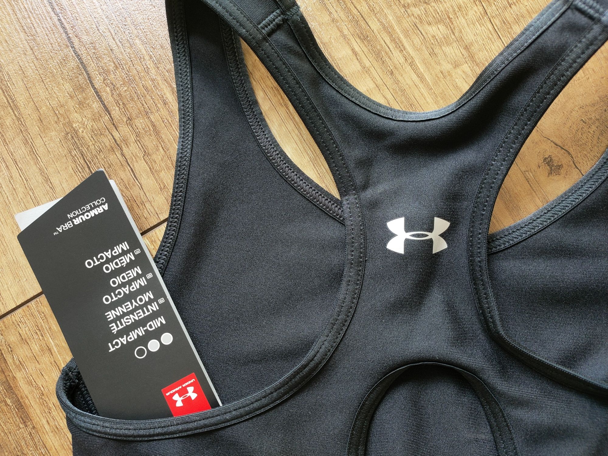 Stanik Under Armour Mid Impact czarny sportowy na treningi r. S
