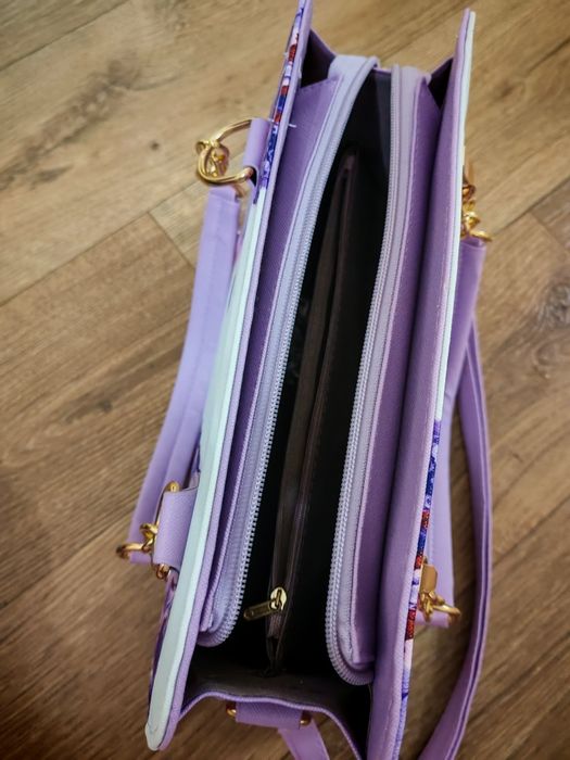 Дуже гарна оригінальна каркасна сумка фіолетова з квітами