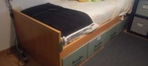 Cama com arrumação