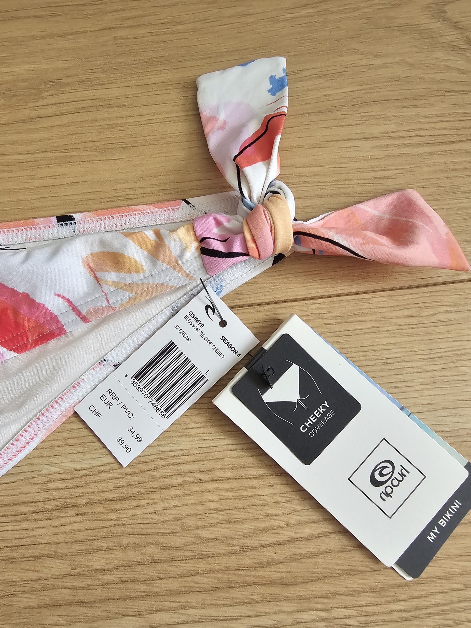 Dół od bikini Rip Curl rozmiar L Cheeky coverage