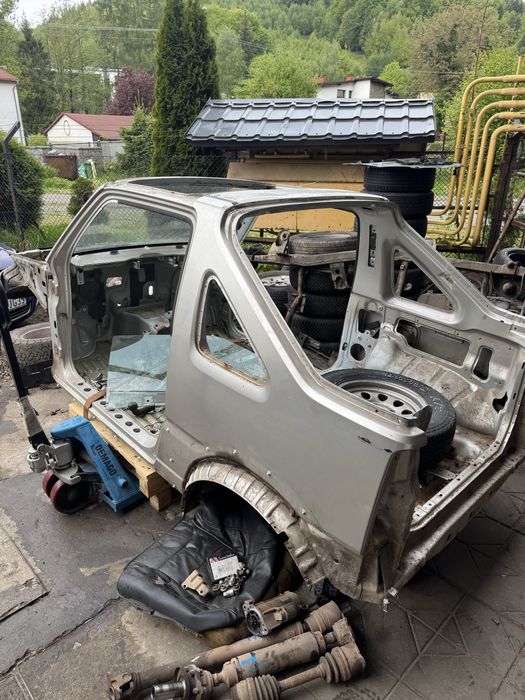 ćwiara PRÓG błotnik tyłk  suzuki jimny cabrio części