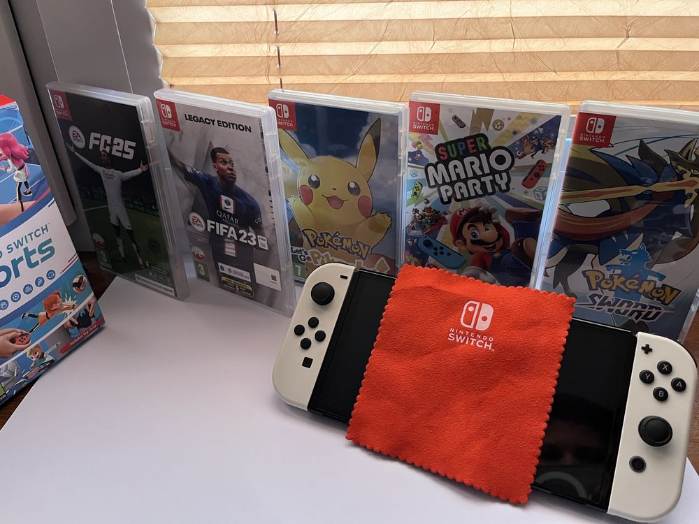 Nintendo Switch OLED + 6 gier + pokrowiec | Pokémon, Mario, FIFA