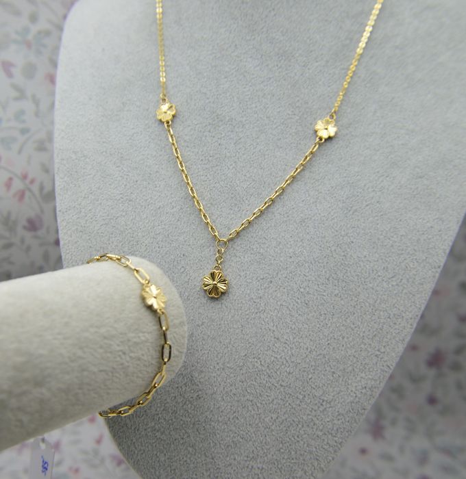 Złoty komplet biżuterii z koniczynami czterolistnymi bransoletka 585