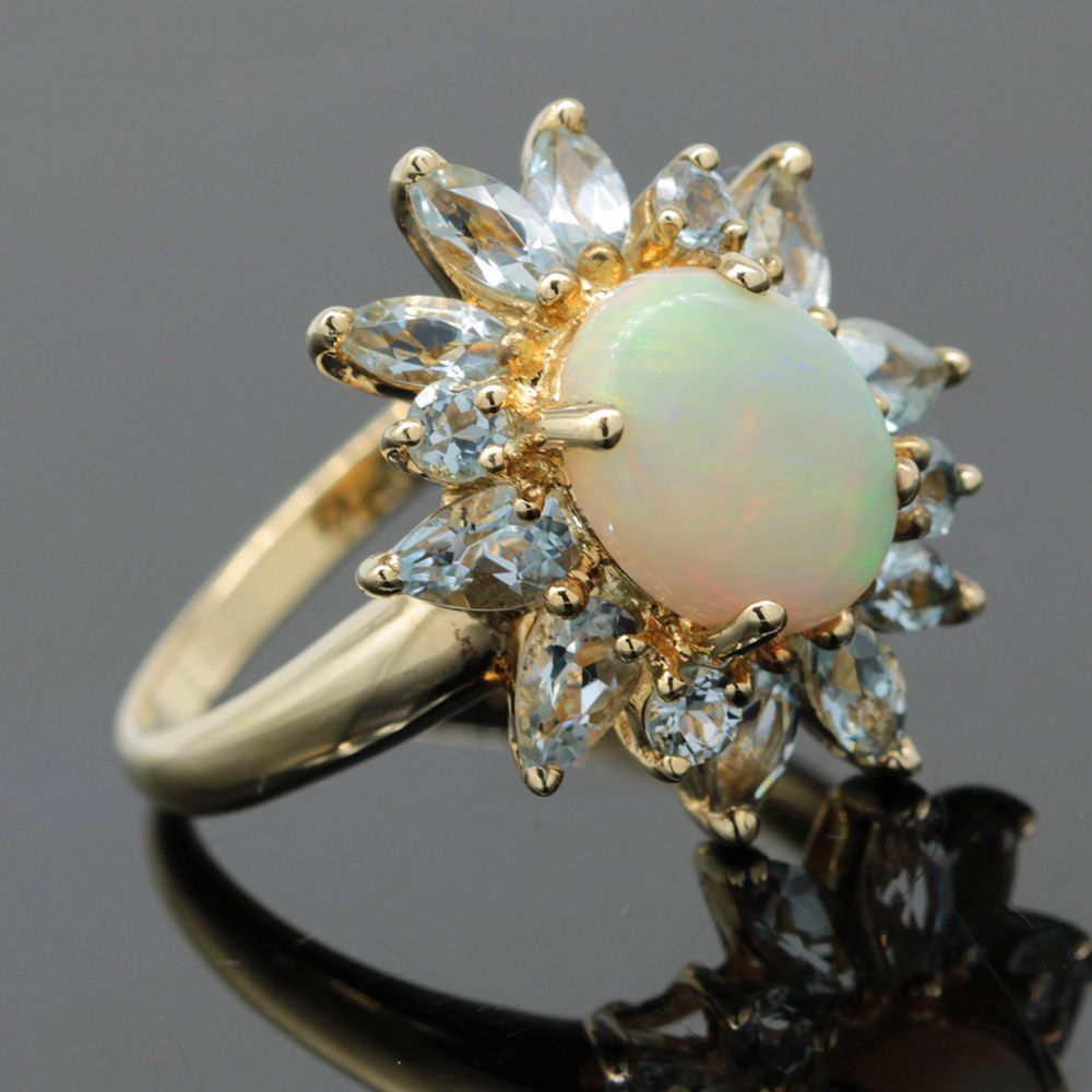 Złoty pierścionek z opalem i akwamarynami duży kwiatek 9K