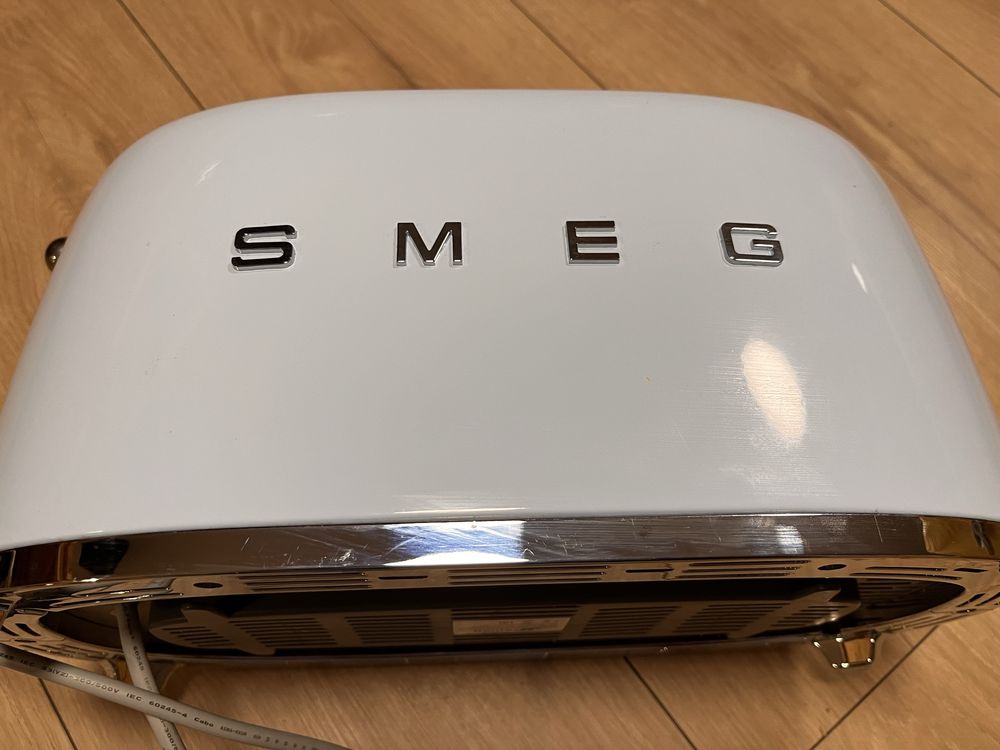 Toster Smeg na 4 kromki używany w bardzo dobrym stanie jasnoniebieski