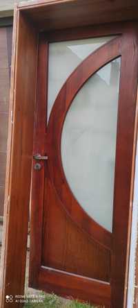 Drzwi  drewniane z ościeżnicą,klamką ,zamkiem