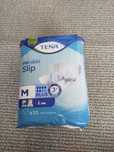 Tena Slip Proskin Plus pieluchomajtki, rozmiar M, 10 szt.