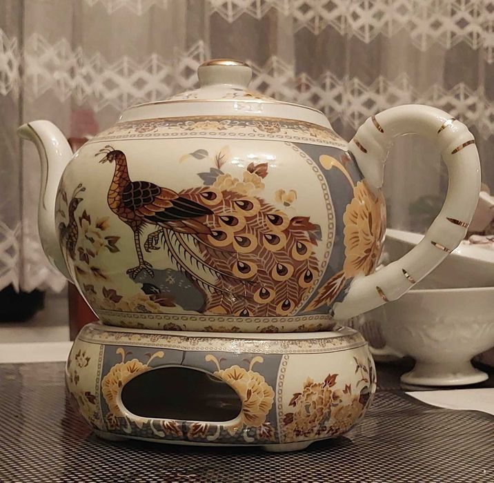porcelanowy imbryk z podgrzewaczem i zaparzaczem (sitkiem)