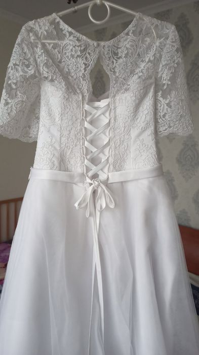 Нові 50 розміру весільні сукні