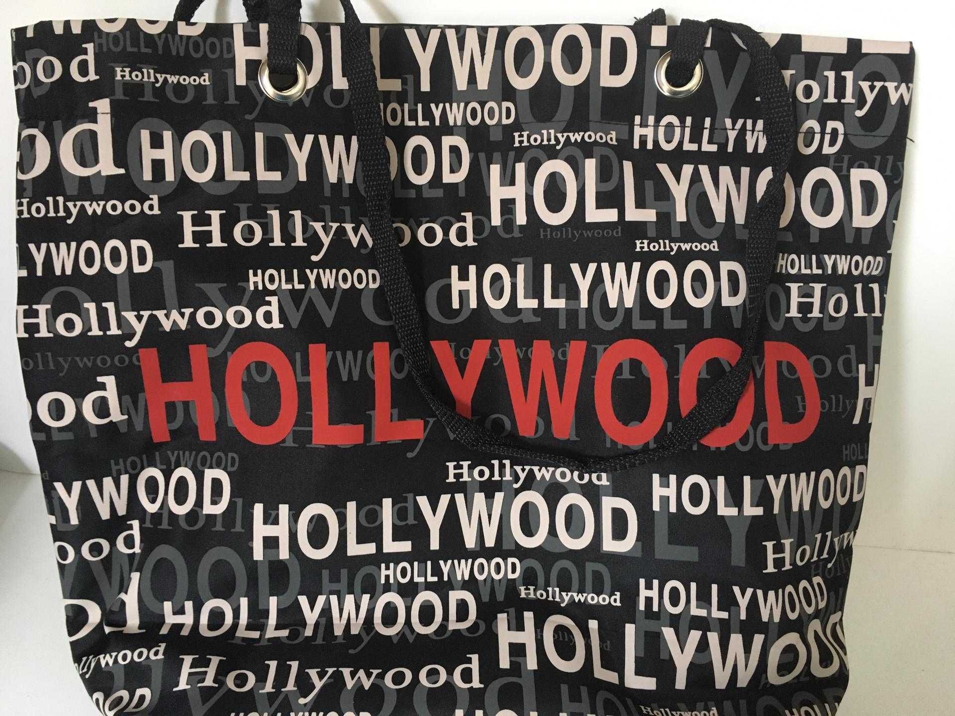 Saco Preto, Branco e Vermelho a dizer HOLLYWOOD