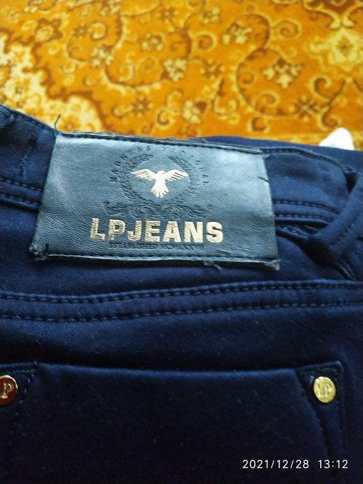 Продам теплі, на флісі джинсові брюки