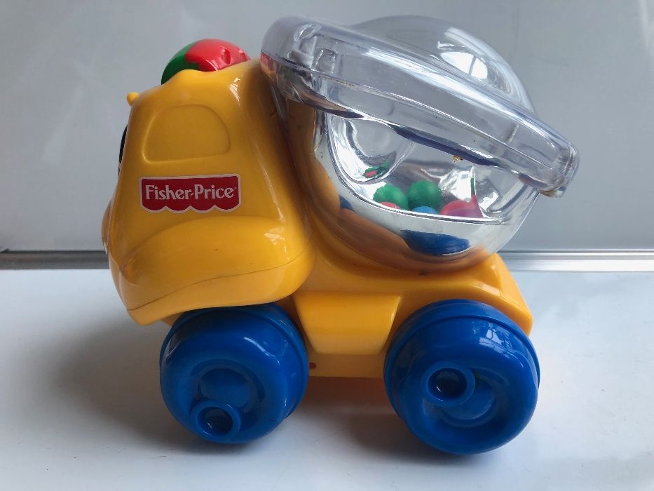 Samochodzik FISHER PRICE z kulkami, Ciężarówka CAT dźwięk i światło