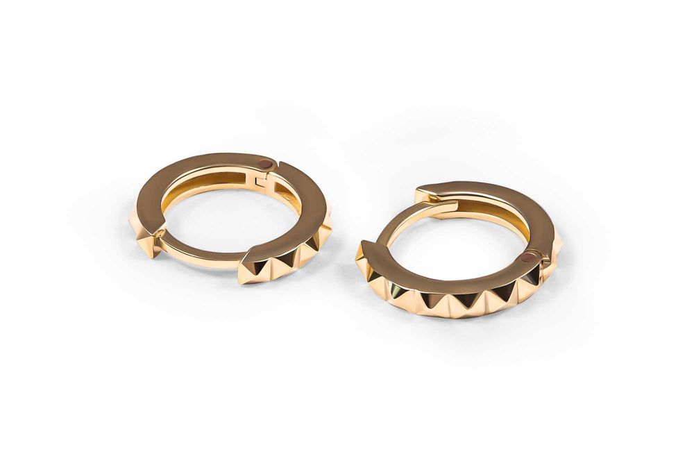 Стильные золотые сережки конго