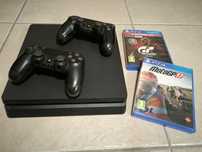 PS4 como nova com 2 comandos e 2 jogos