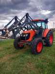 Kubota M 108 S z turem z łyżką i  widłami brutto