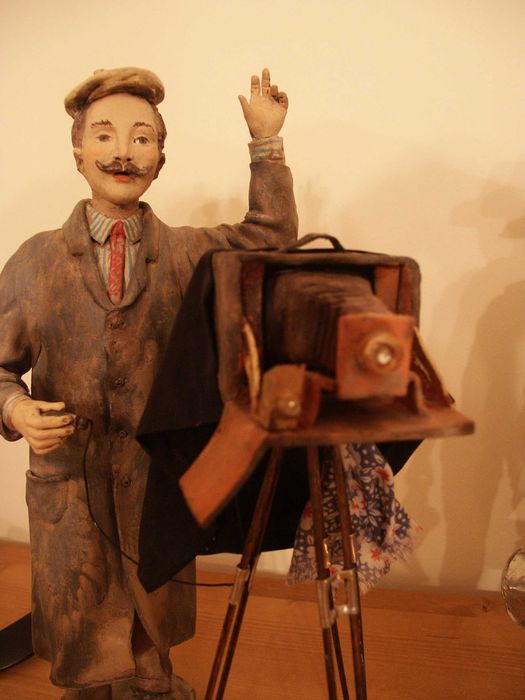 Estatueta de barro – fotógrafo