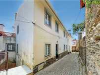 Moradia T5 em bom estado com varanda, visitas boas,sala de festas e ar