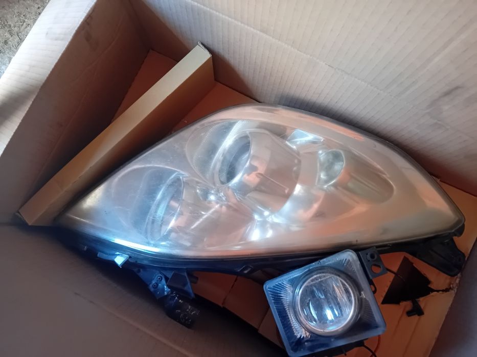 Opticas opel vectra