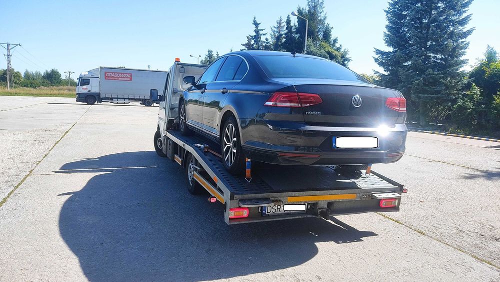 Tani transport holowanie motocykle autolaweta przyczepa pomoc drogowa