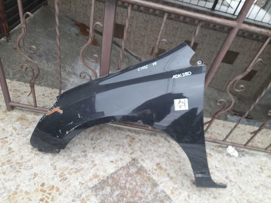 Крыло Honda Civic-7. 2004г левое пер. оригинал