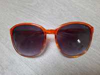 Okulary przeciwsłoneczne z pomarańczową obramówką