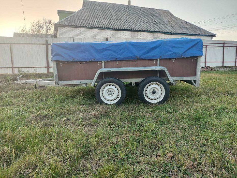 Двовісний оцинкований бакелітовий причіп, рама підсилена 2.60/1.60/0.5