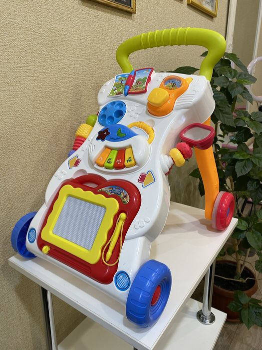 Іграшка Каталка-Ходунки (happy BABY “ПЕРШІ КРОКИ Baby-walker“)