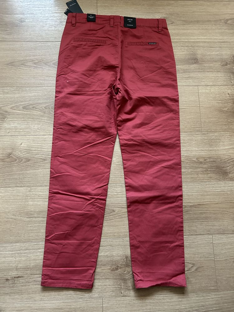 Spodnie chino nowe 170