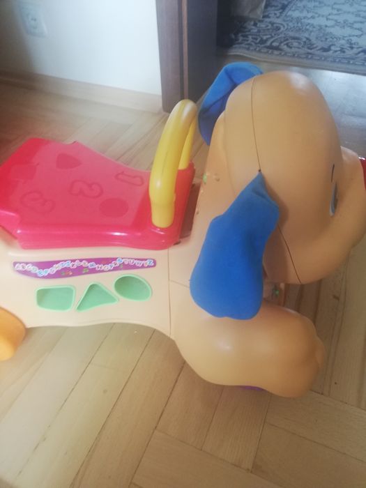 Jeździk dla  dzieci szczeniaczek Fisher price