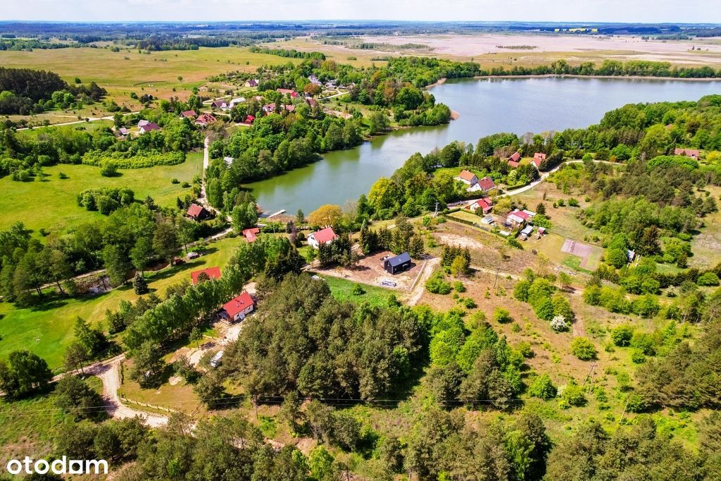 Piękne działki w otoczeniu krzewów z dostępem do jeziora Buwełno