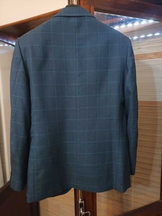 Blazer de homem azul acinzentado